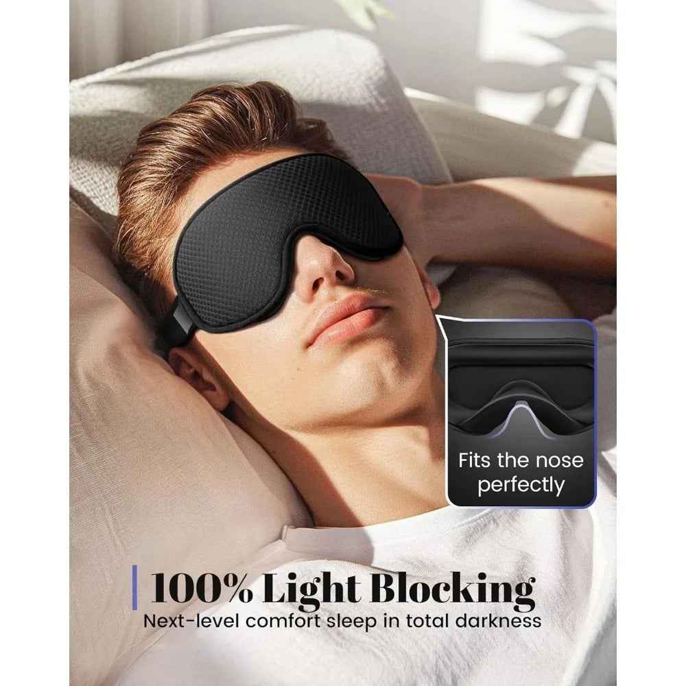 Man wearing black 3D sleep eye mask with nose-fitting design, promoting 100% light blocking for deep, uninterrupted sleep.